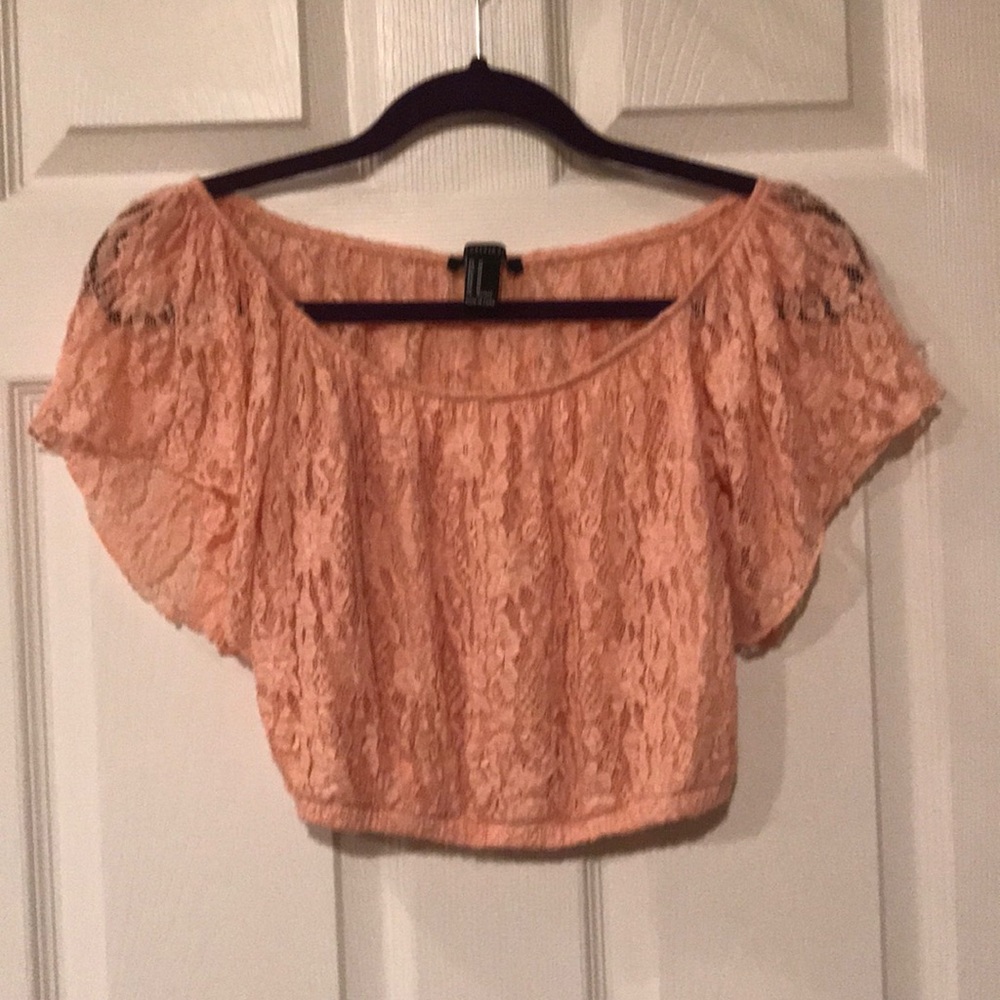Peach crop top.